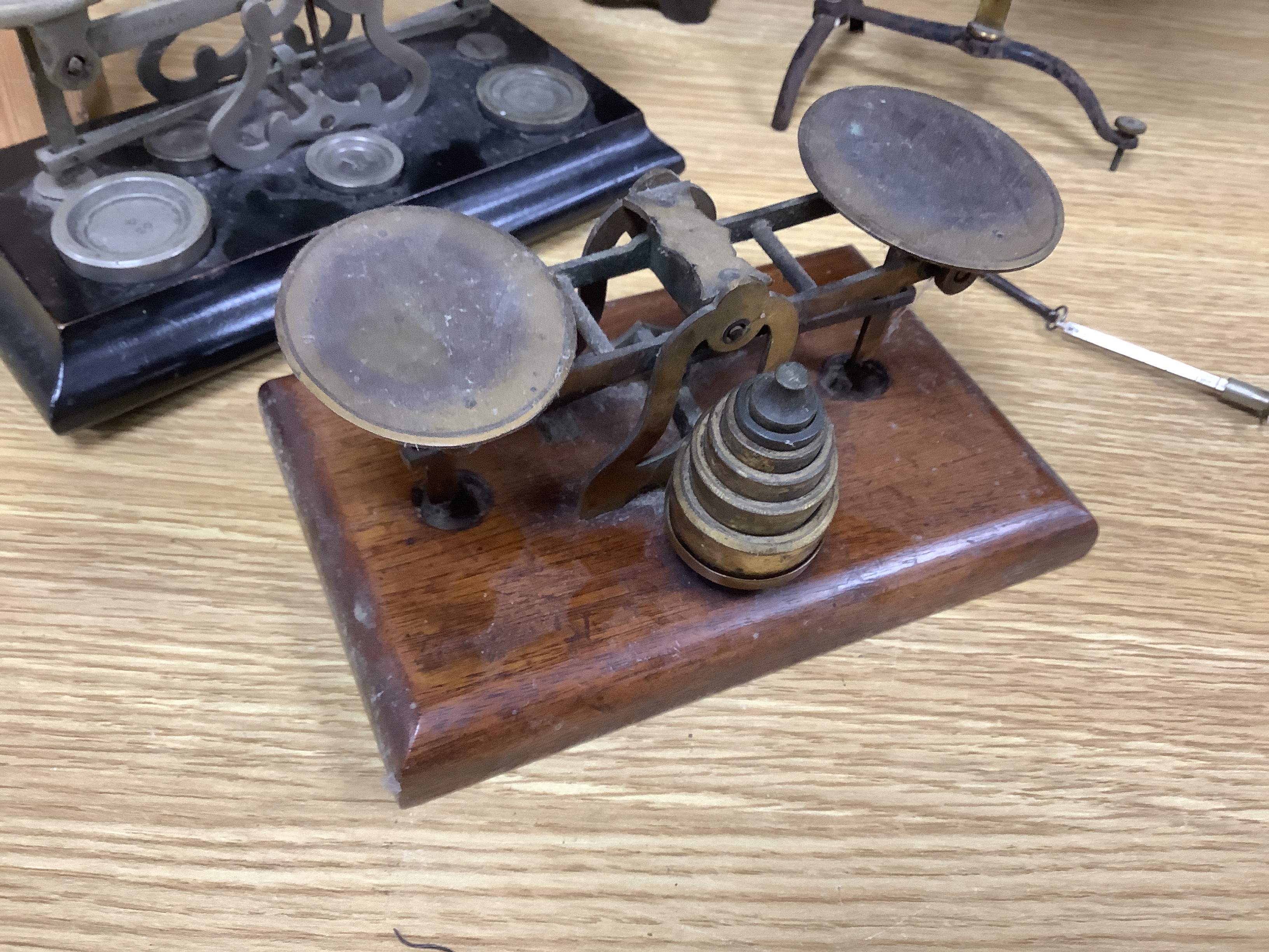 Five various postal scales, largest 55cm wide